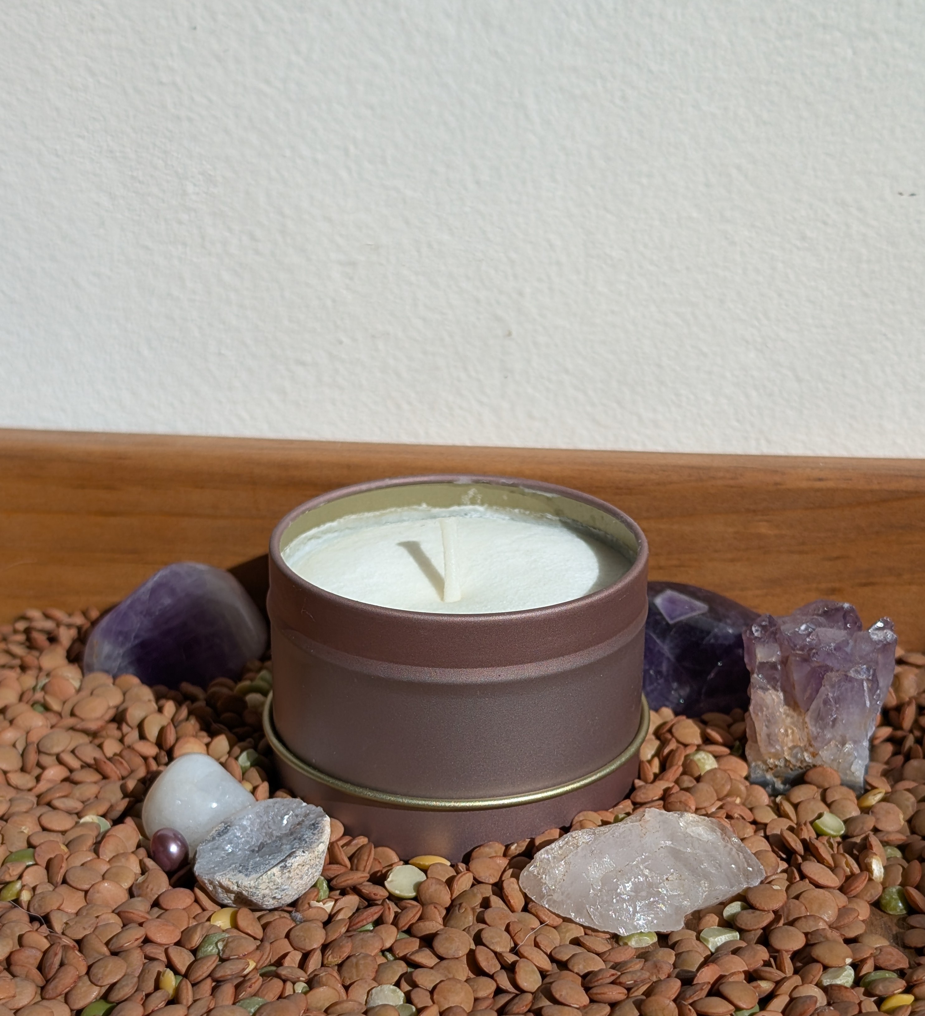 Needle felted candle in warm pastel tones